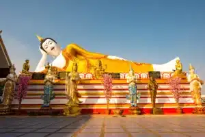 Blog 42 Reclining Buddha statue at Phra That Doi Kham temple, a peaceful cultural landmark found in the best parks in Chiang Mai